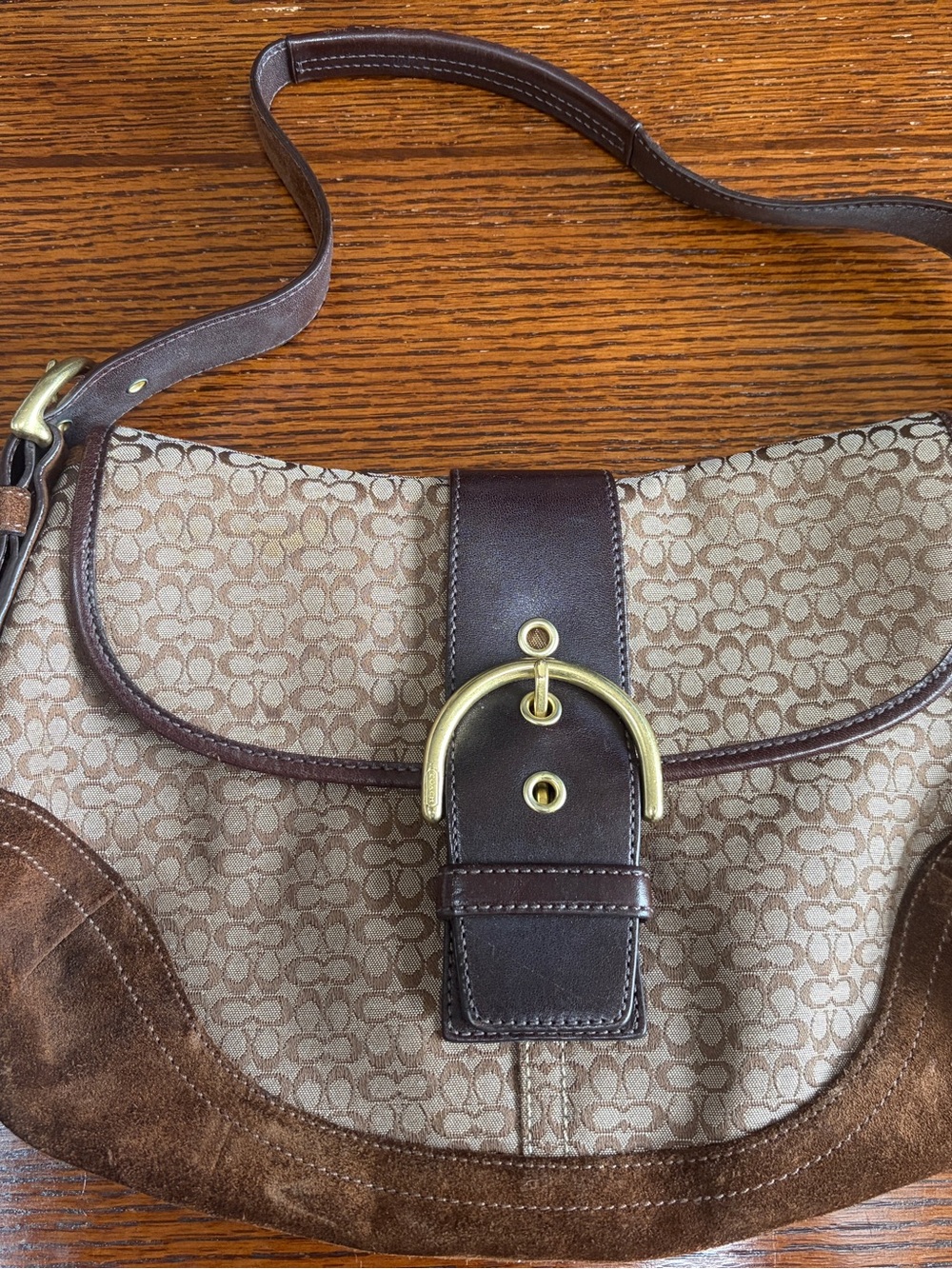 Brown suede coach signature bag